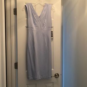 Sleeveless, light blue workwear dress. Size 6. Never worn, tags still on.